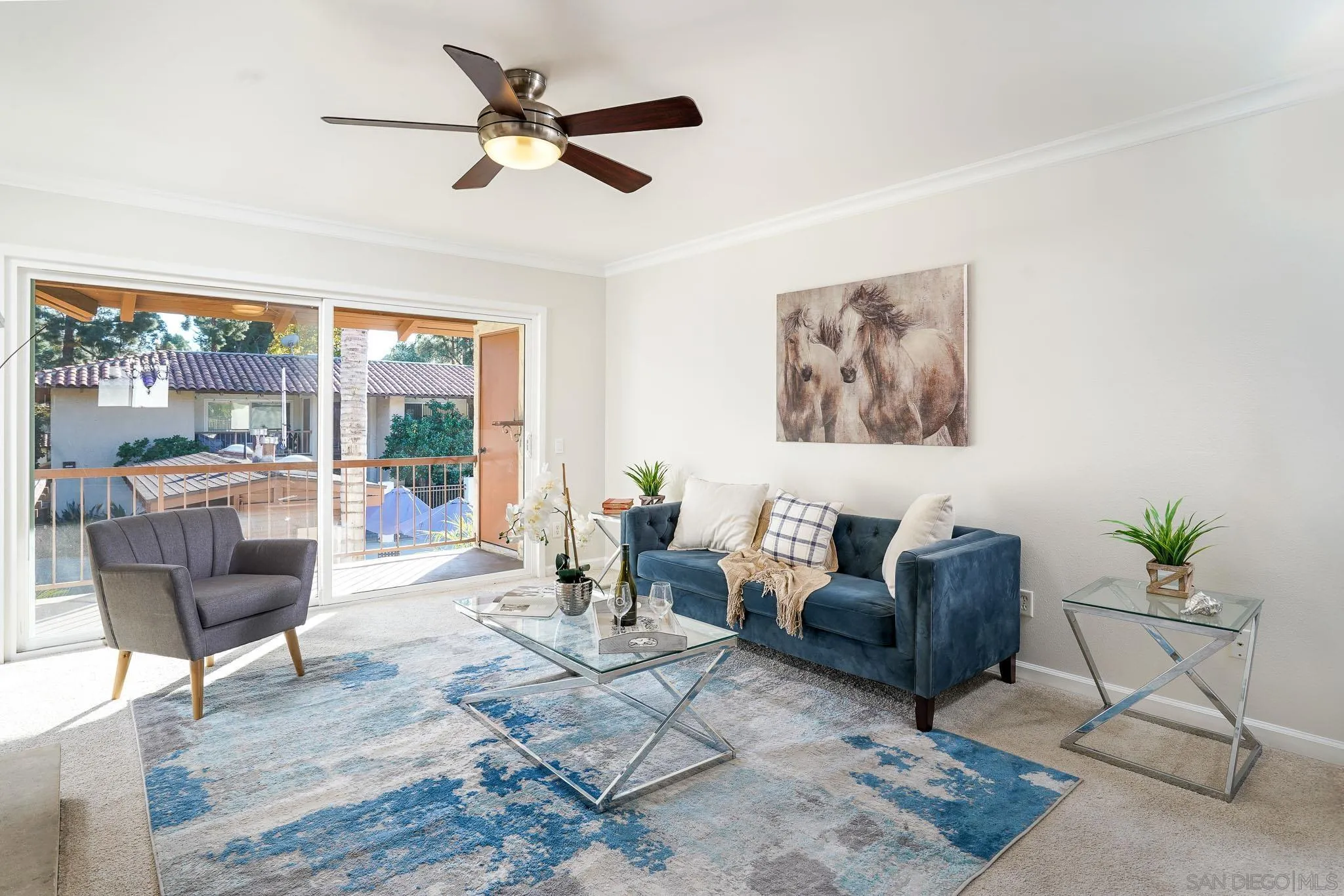 6069 Rancho Mission Road, Unit 201 San Diego, CA 92108 - Photo 7 of 43 a living room with furniture and a large window