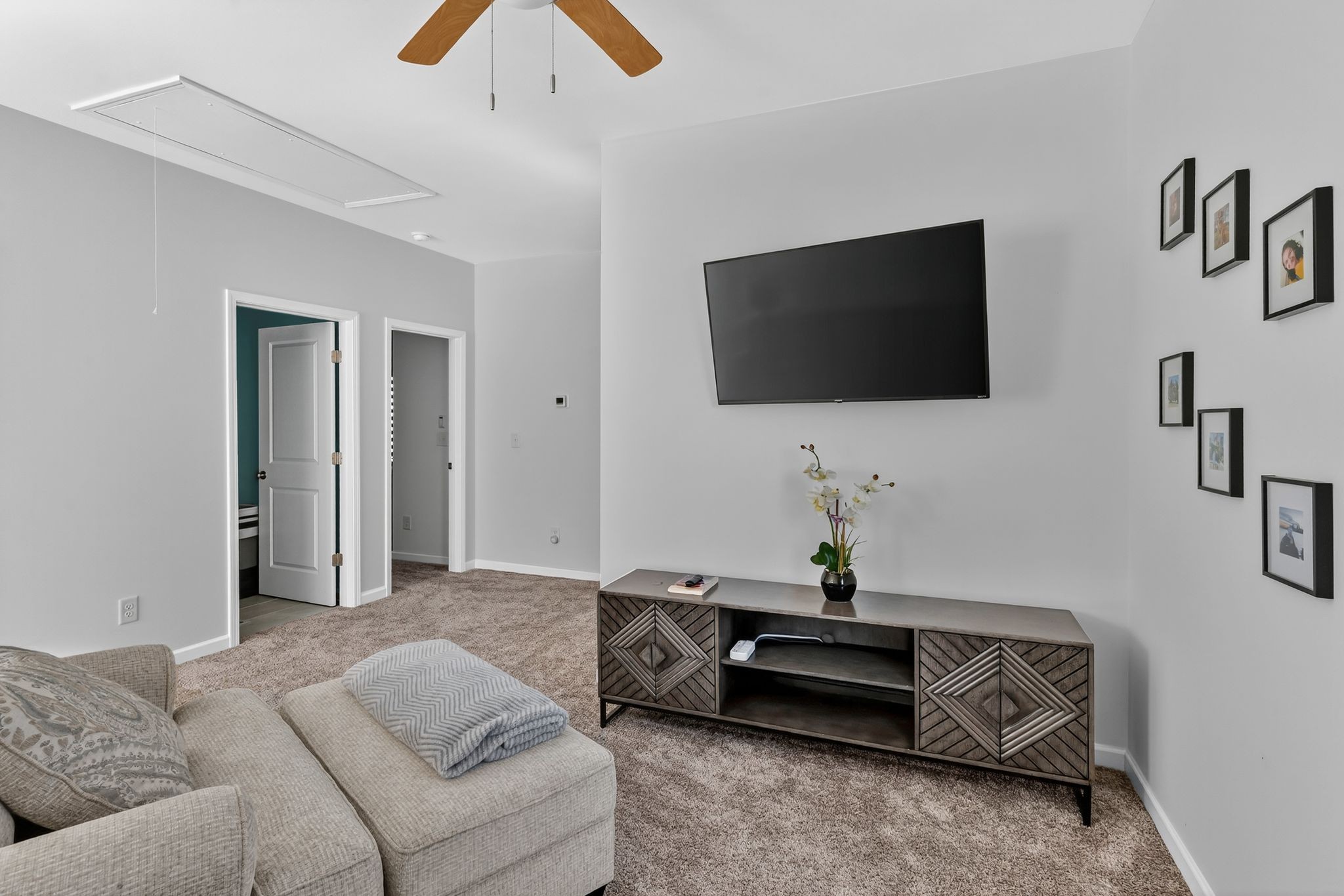 348 Winston Way Gallatin, TN 37066 - Photo 14 of 27 a living room with furniture and a flat screen tv