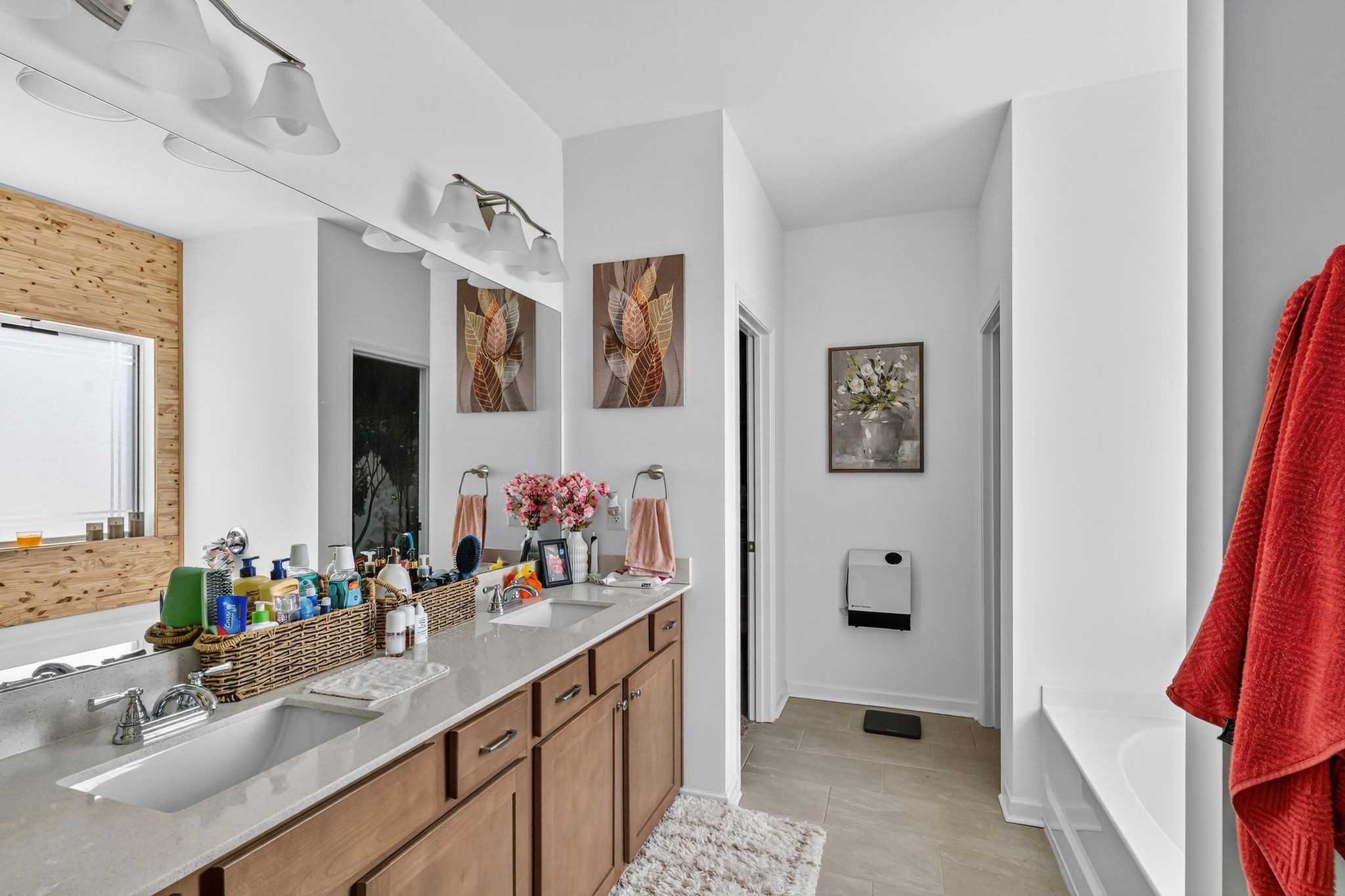 348 Winston Way Gallatin, TN 37066 - Photo 18 of 27 a bathroom with double vanity sink and a mirror