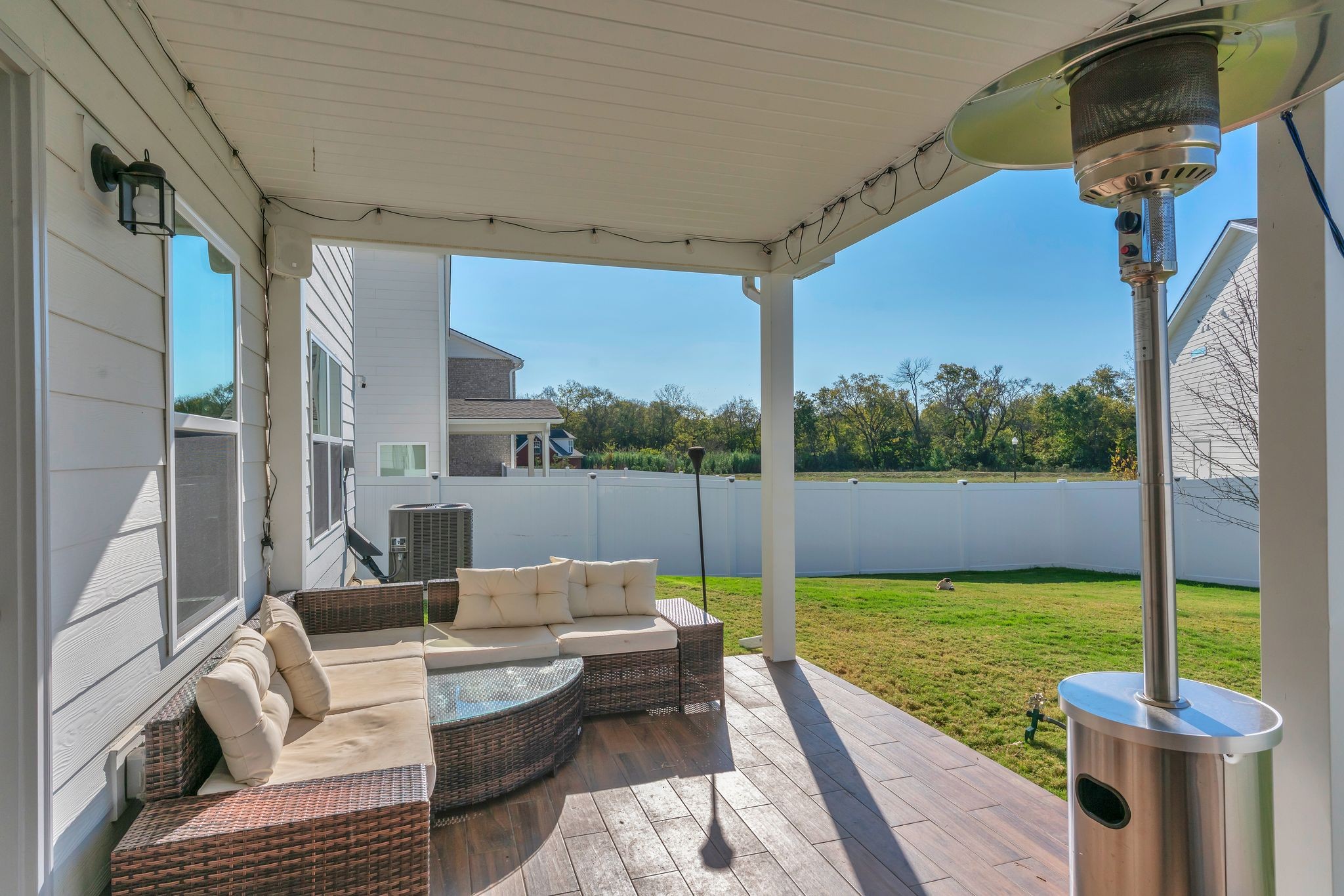348 Winston Way Gallatin, TN 37066 - Photo 25 of 27 a view of a patio with couches chairs dining table and chairs