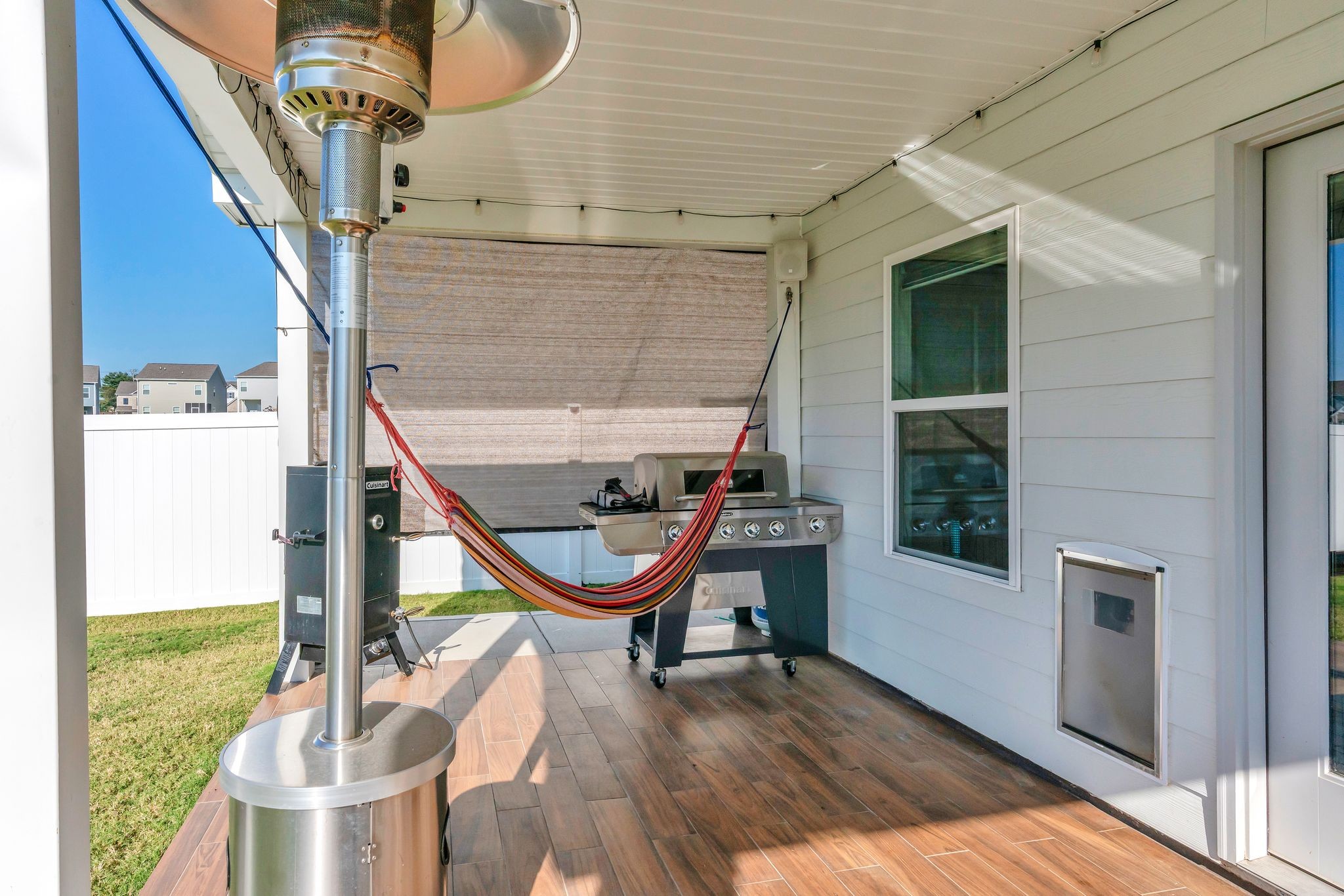 348 Winston Way Gallatin, TN 37066 - Photo 26 of 27 a view of a porch with a table and chairs