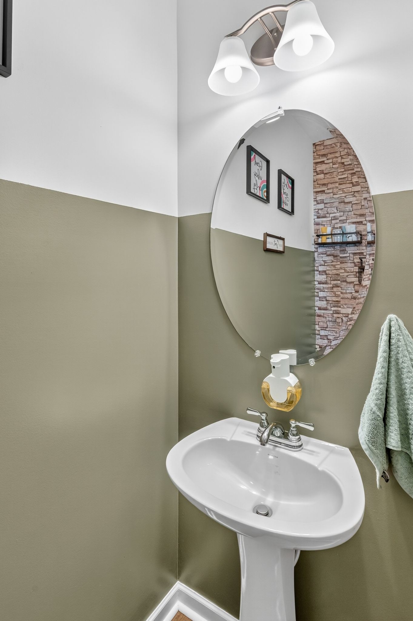 348 Winston Way Gallatin, TN 37066 - Photo 6 of 27 a bathroom with a sink a mirror and toilet