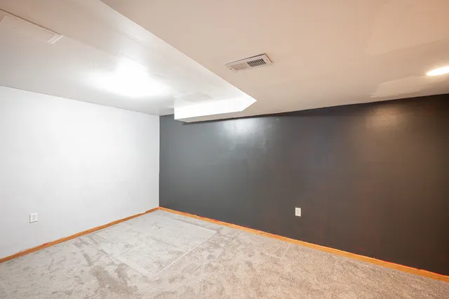 an empty room with a workbench