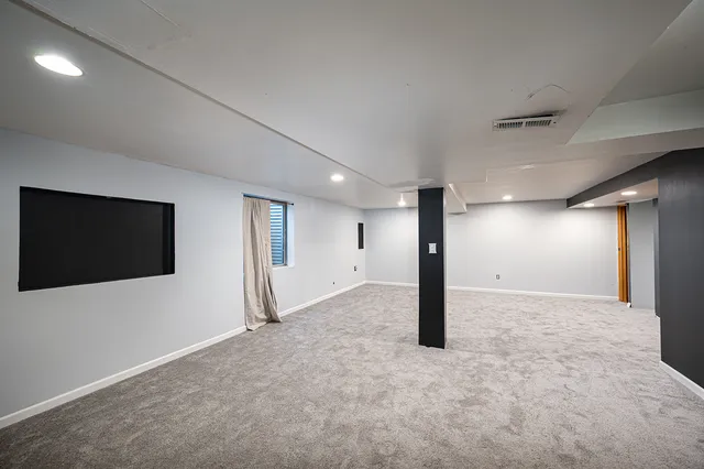 a view of a livingroom with a flat screen tv