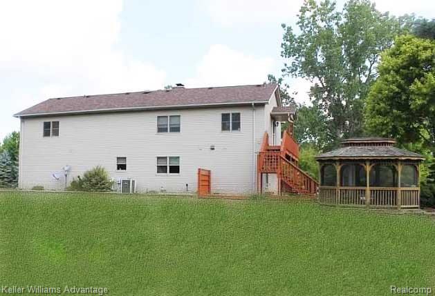 6097 Stout Road Carleton, MI 48117 - Photo 30 of 36 Back Exterior.jpg