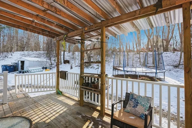 a view of city street with a covered with snow