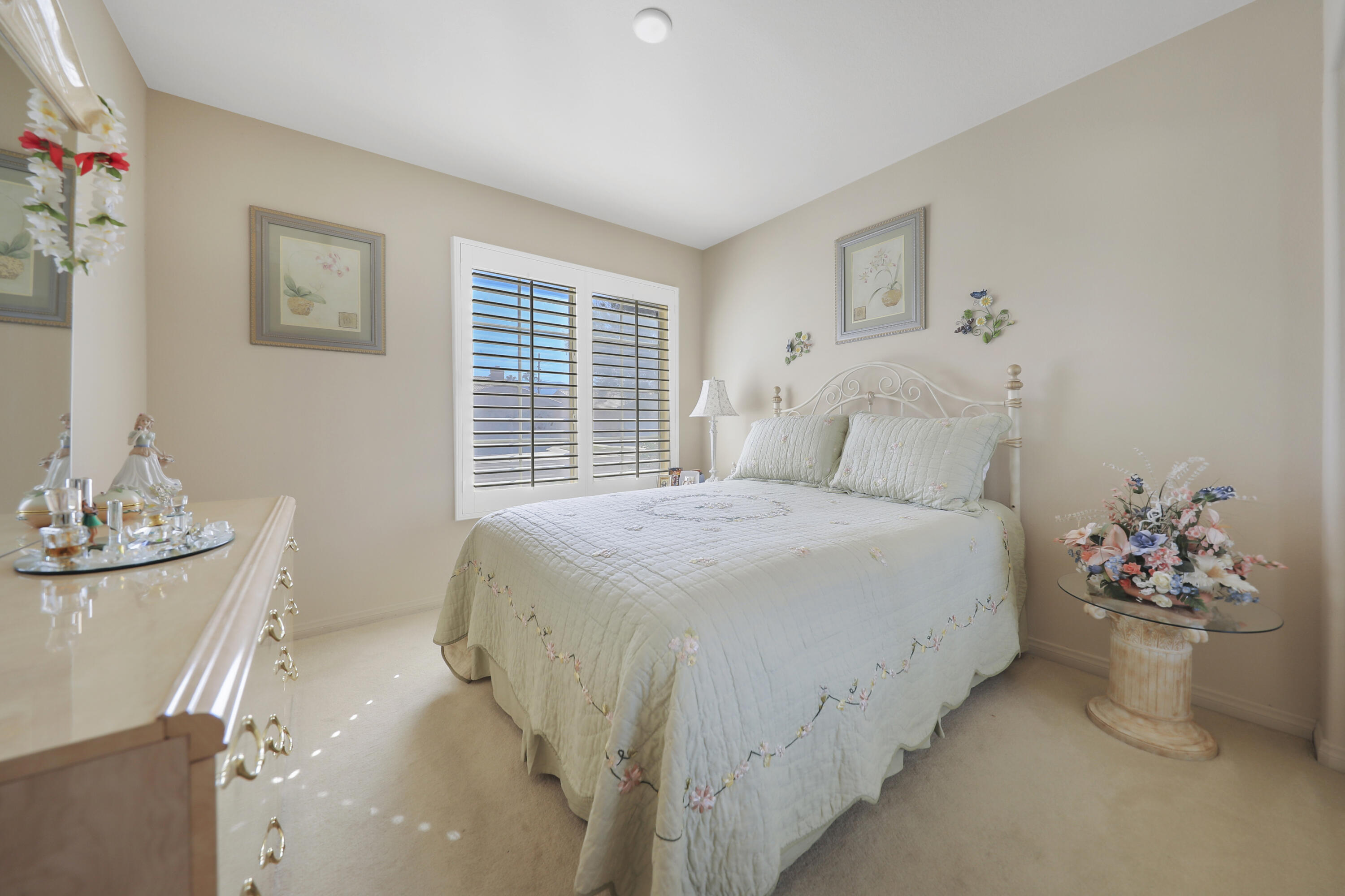 80628 Virginia Avenue Indio, CA 92201 - Photo 22 of 34 a bedroom with a bed and window