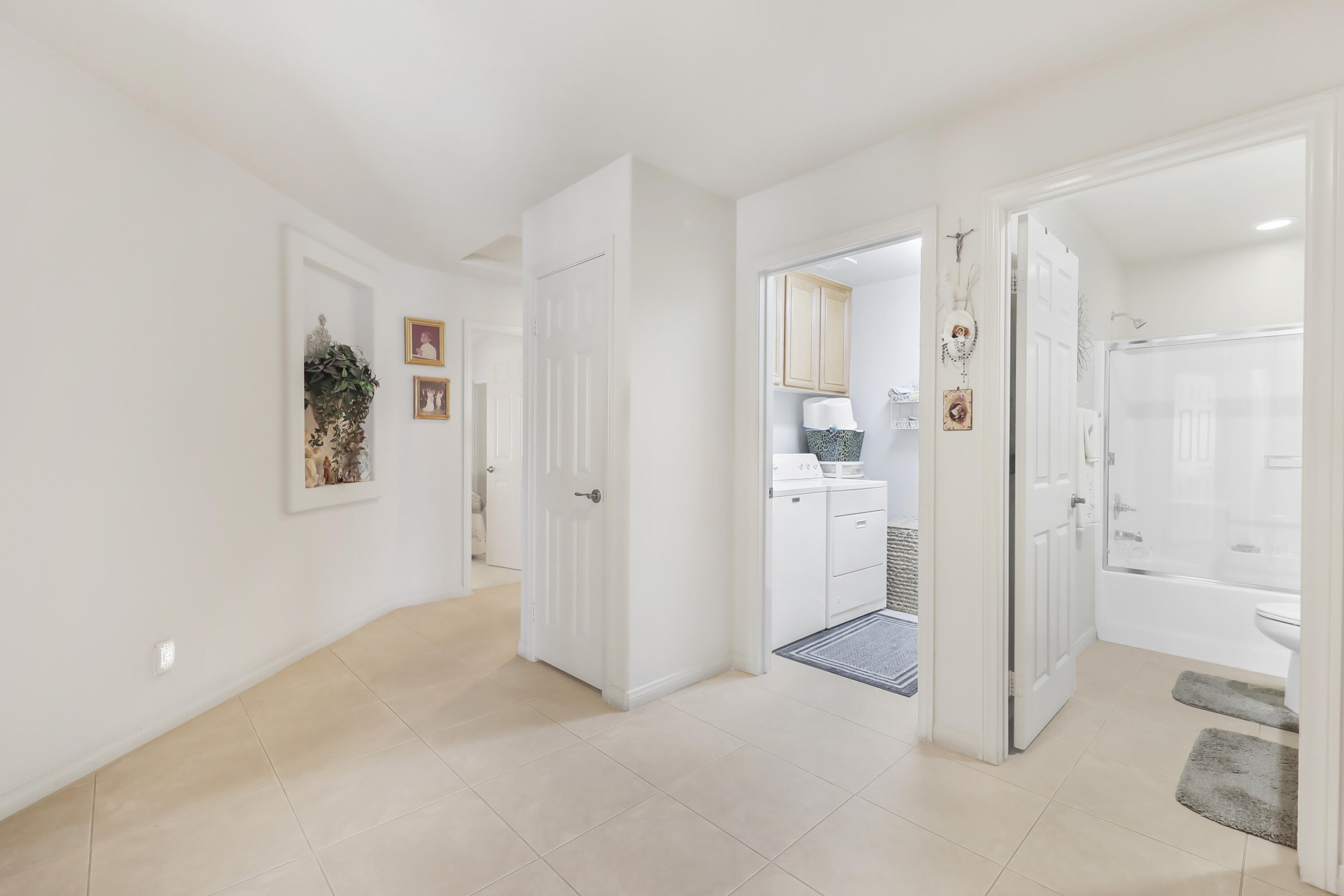 80628 Virginia Avenue Indio, CA 92201 - Photo 24 of 34 a view of a hallway with closet and bathroom