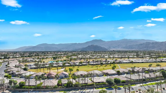 a view of a city with an ocean view