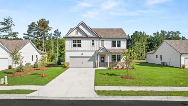 front view of a house with a yard