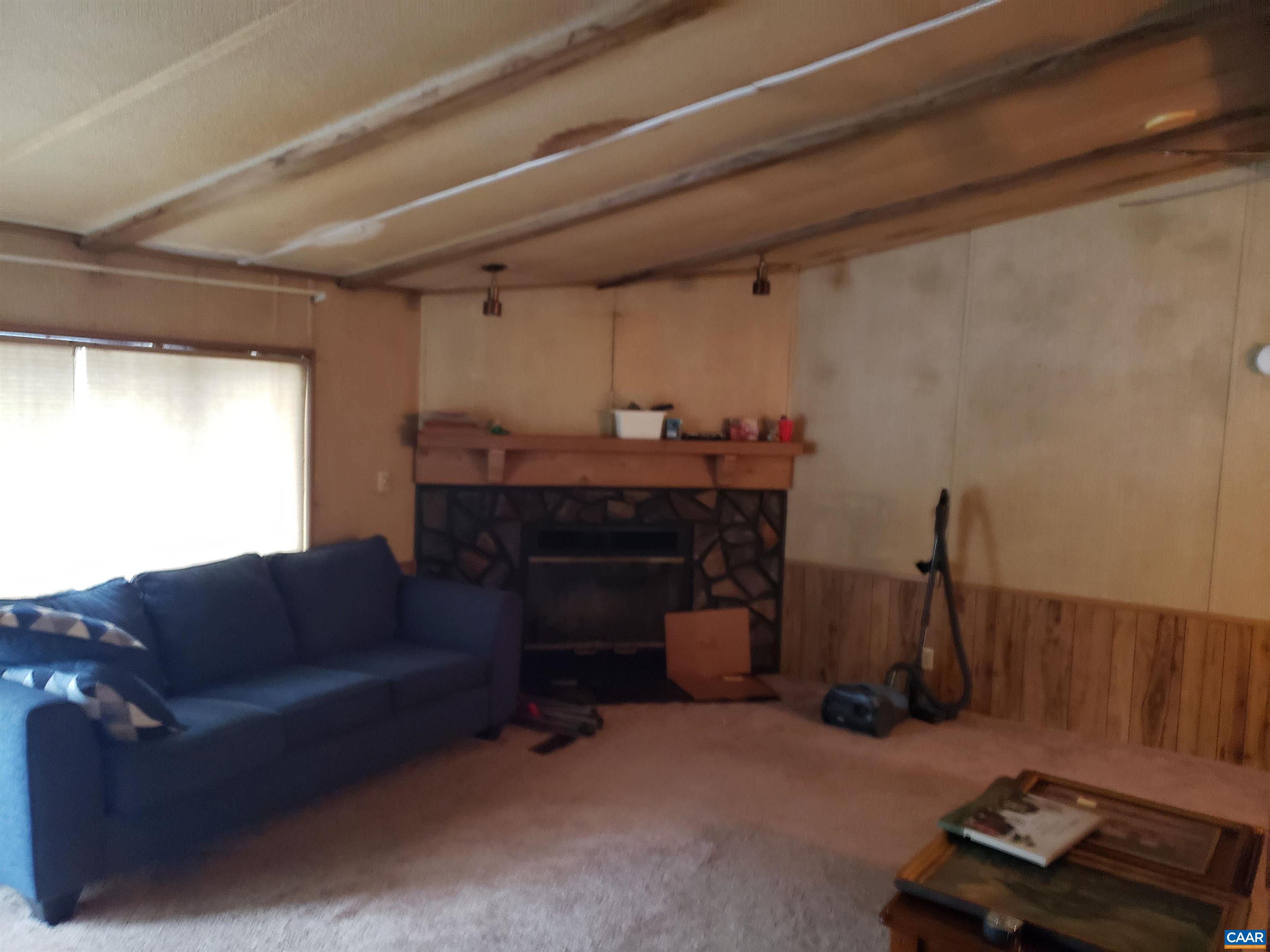 1363 Dunnes Shop Road Ruckersville, VA 22968 - Photo 17 of 29 a living room with furniture