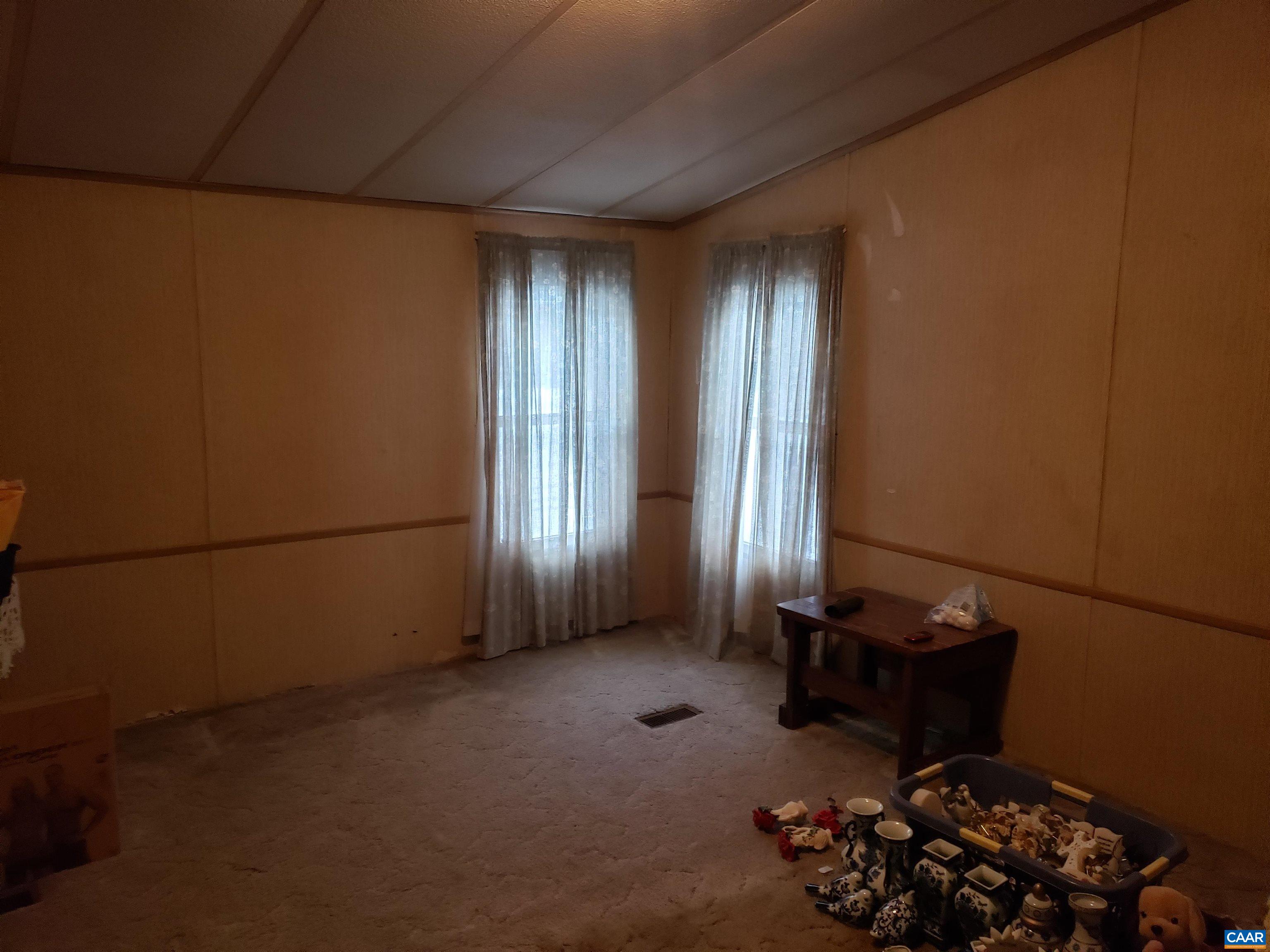 1363 Dunnes Shop Road Ruckersville, VA 22968 - Photo 21 of 29 a view of room with toys and a window