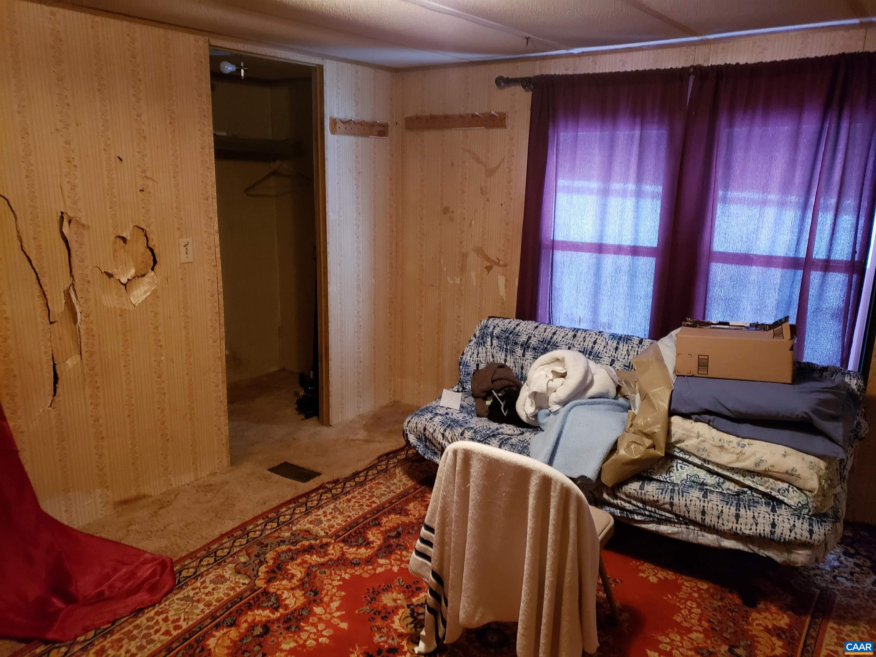 1363 Dunnes Shop Road Ruckersville, VA 22968 - Photo 25 of 29 a bedroom with a bed and a window