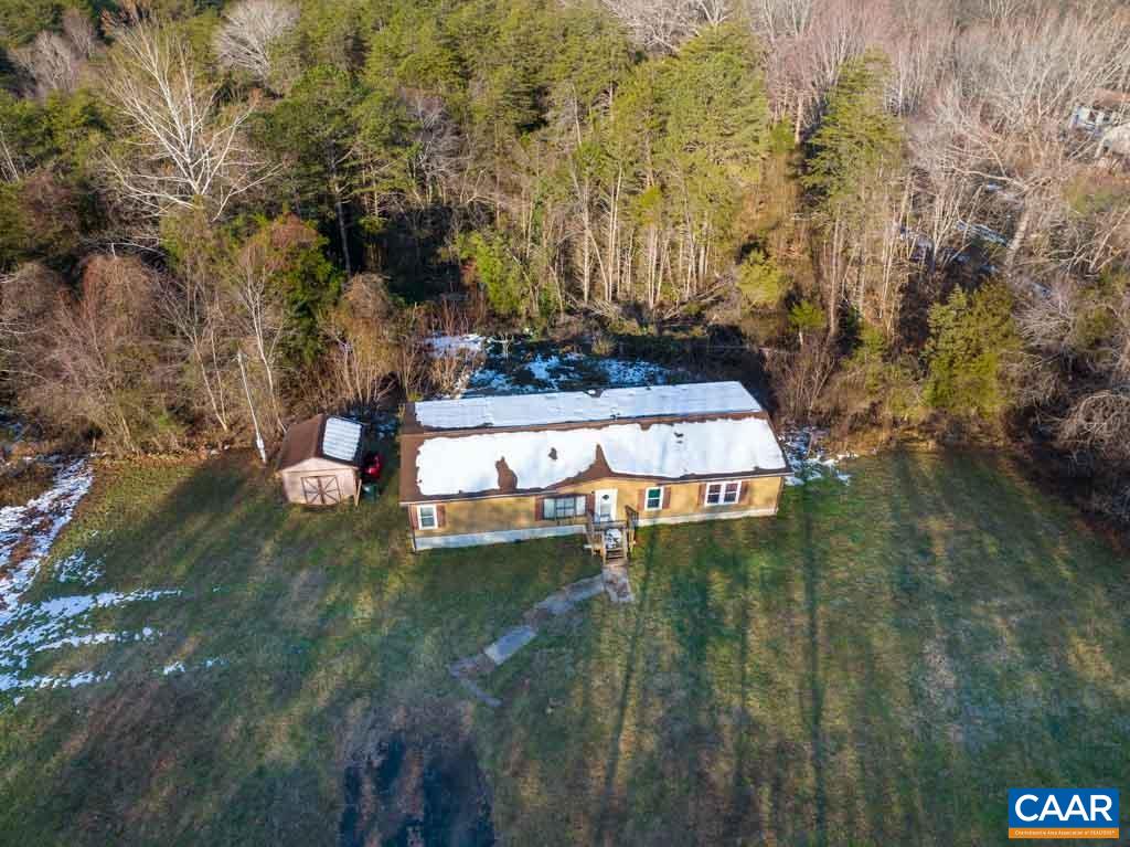 1363 Dunnes Shop Road Ruckersville, VA 22968 - Photo 8 of 29 a swimming pool with some trees