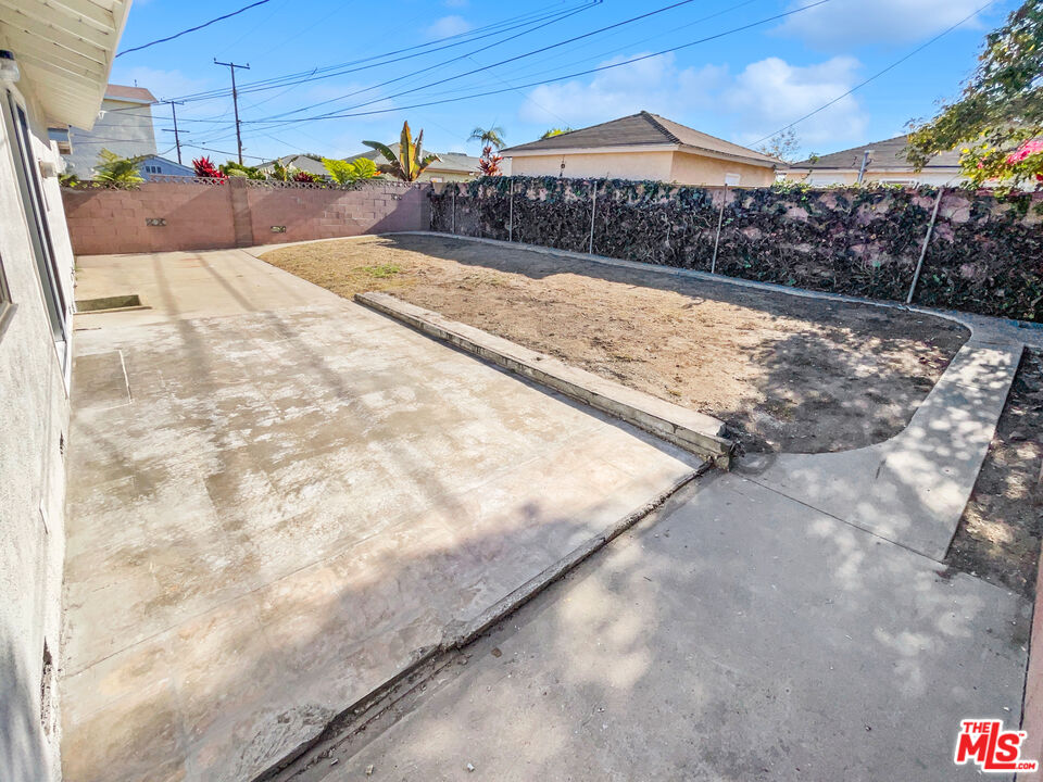 1616 West Piru Street Compton, CA 90222 - Photo 12 of 19 a view of a backyard of the house