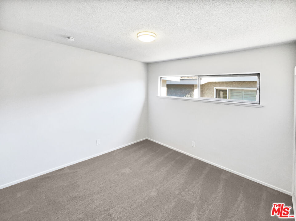 1616 West Piru Street Compton, CA 90222 - Photo 17 of 19 an empty room with a empty space