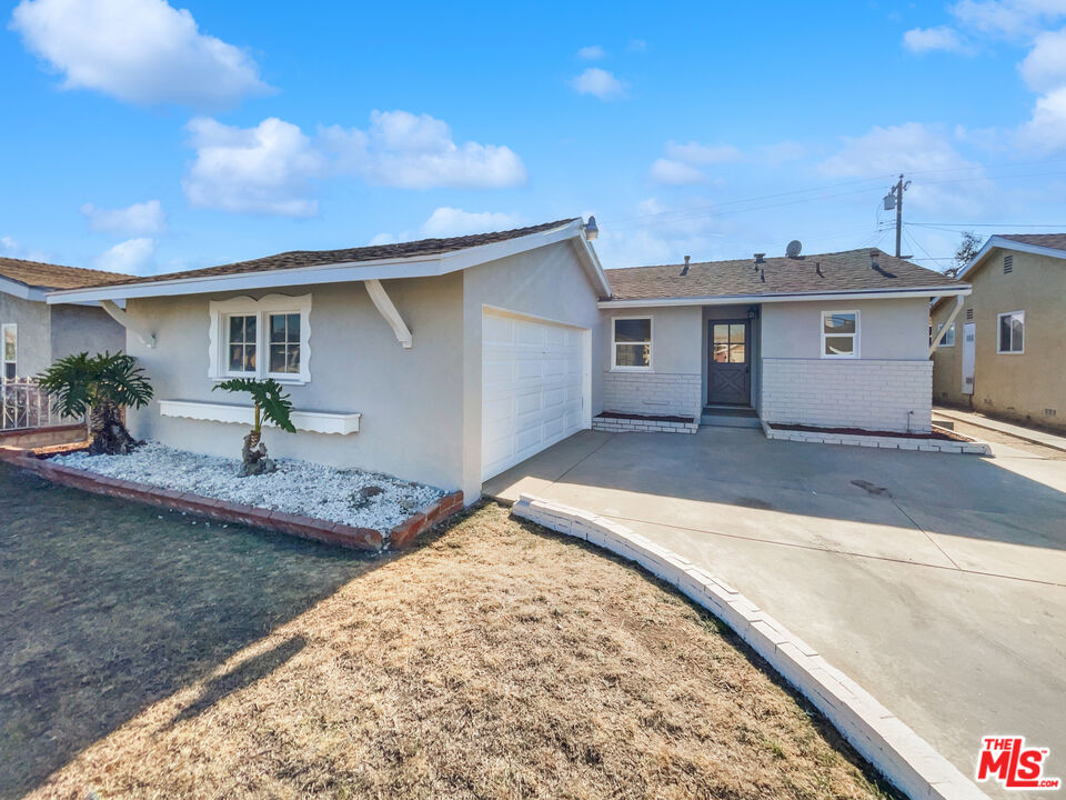1616 West Piru Street Compton, CA 90222 - Photo 10 of 19 a house view with a backyard space