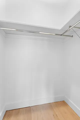 a view of a room with racks on the wall