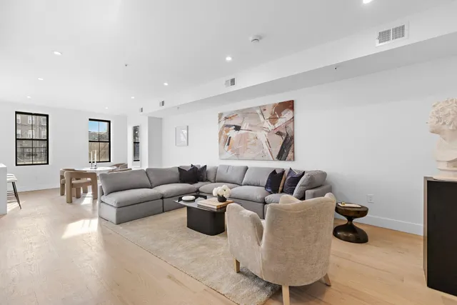 a living room with furniture and a couch