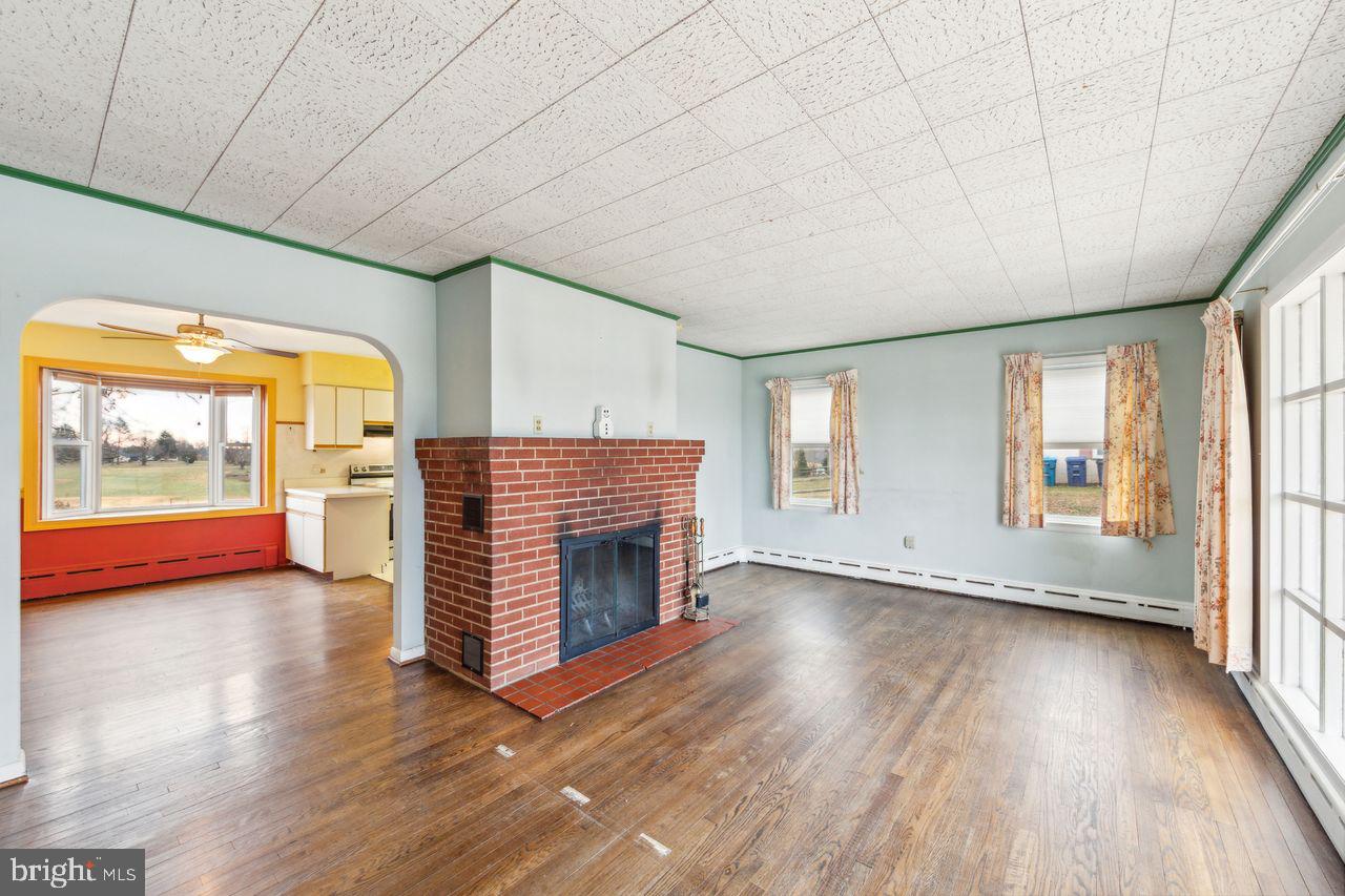 131 Bollinger Road Downingtown, PA 19335 - Photo 6 of 37 Living Rm with wood-burning fireplace