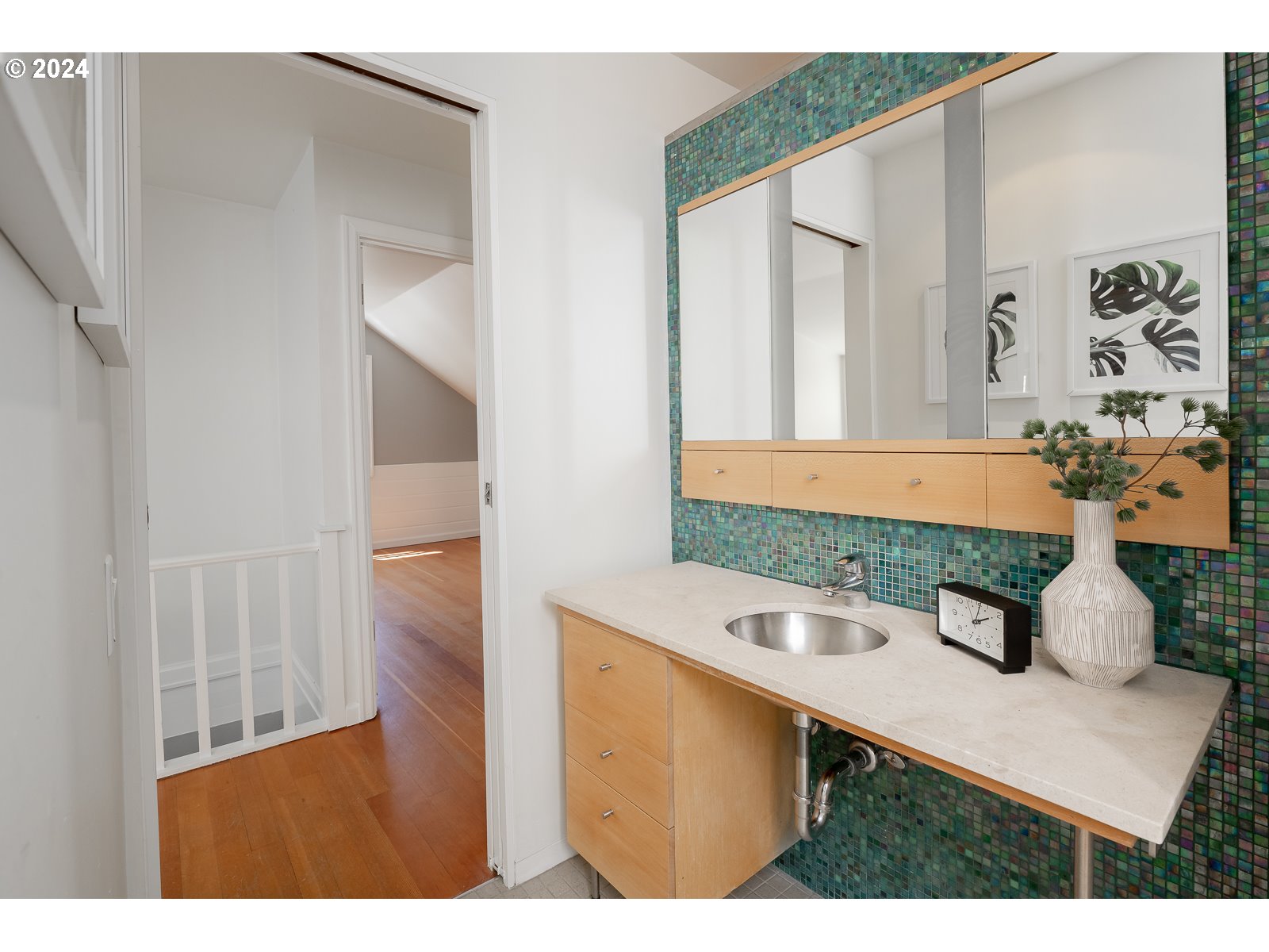4146 Southwest Hamilton Street Portland, OR 97221 - Photo 28 of 43 a bathroom with a sink and a mirror