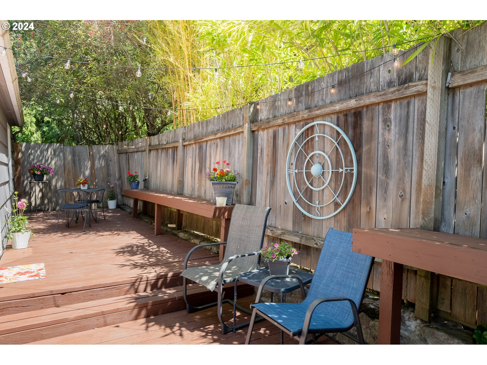 4146 Southwest Hamilton Street Portland, OR 97221 - Photo 37 of 43 a backyard of a house with barbeque oven and furniture