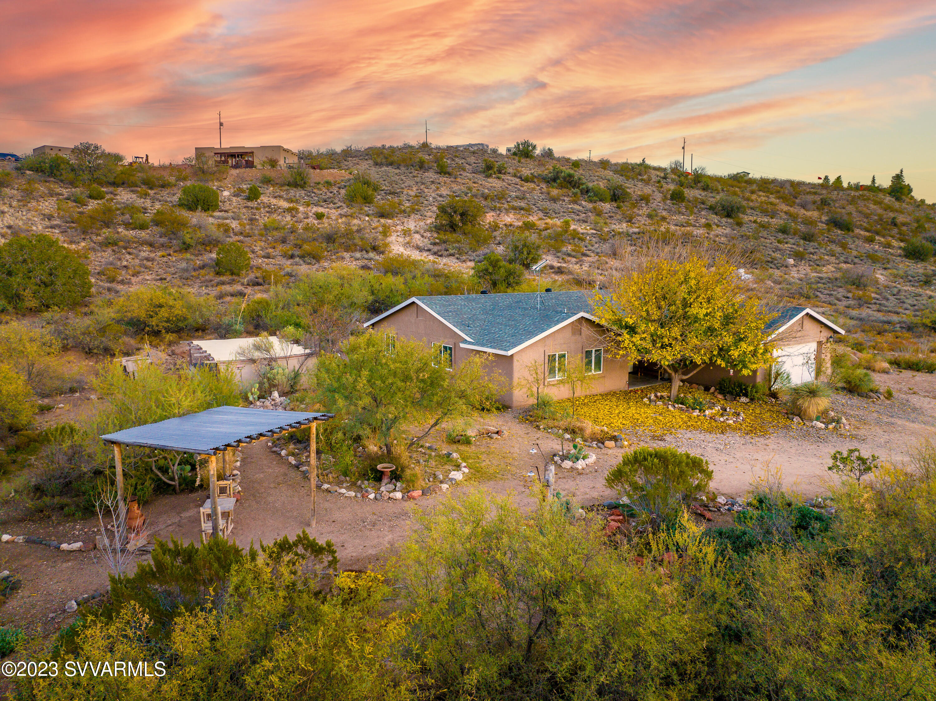 1055 Reay Road Rimrock, AZ 86335 - Photo 1 of 34 an aerial view of residential houses with outdoor space and swimming pool