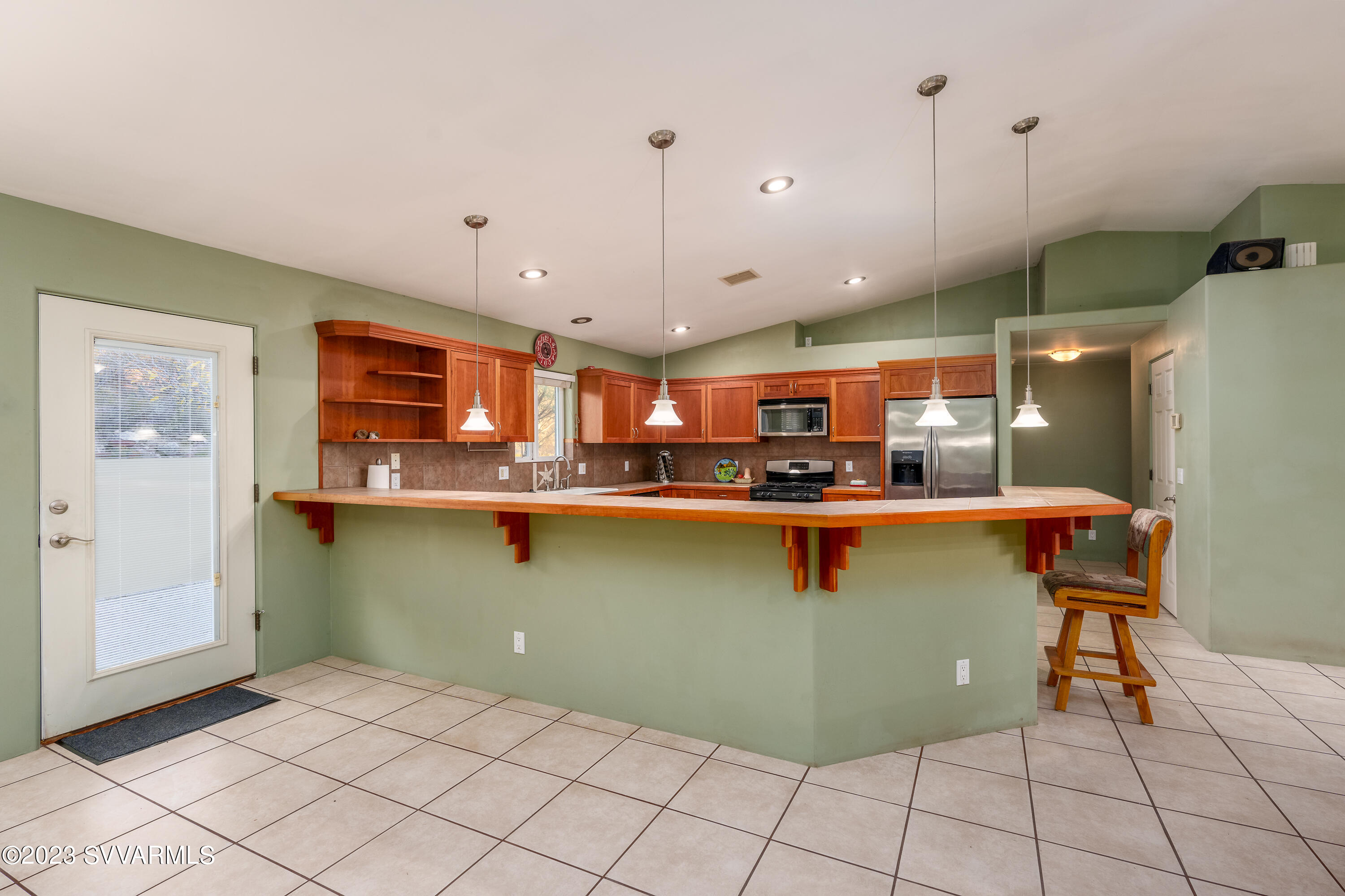 1055 Reay Road Rimrock, AZ 86335 - Photo 14 of 34 a kitchen with granite countertop a sink and cabinets