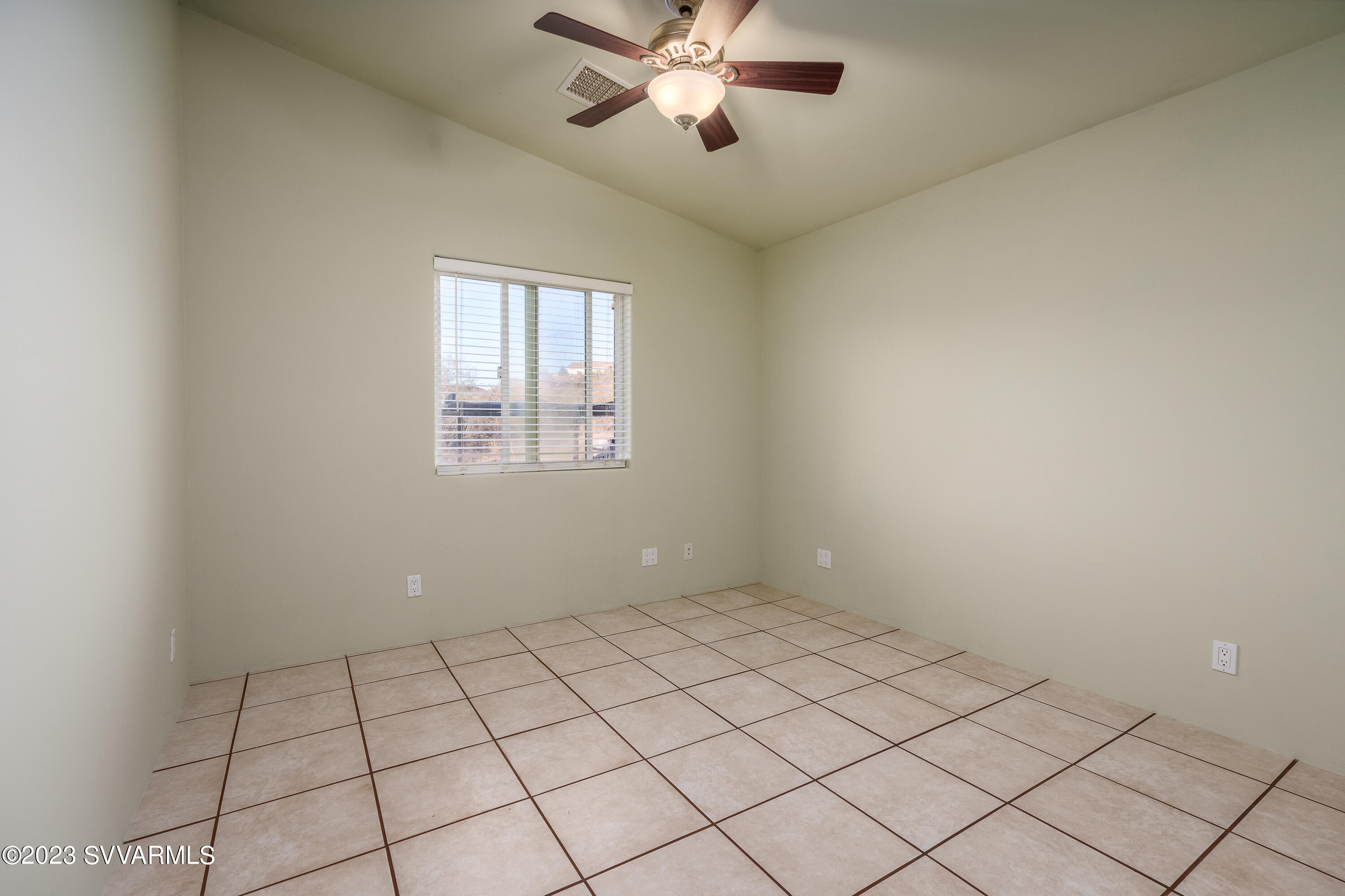 1055 Reay Road Rimrock, AZ 86335 - Photo 22 of 34 a view of an empty room and window