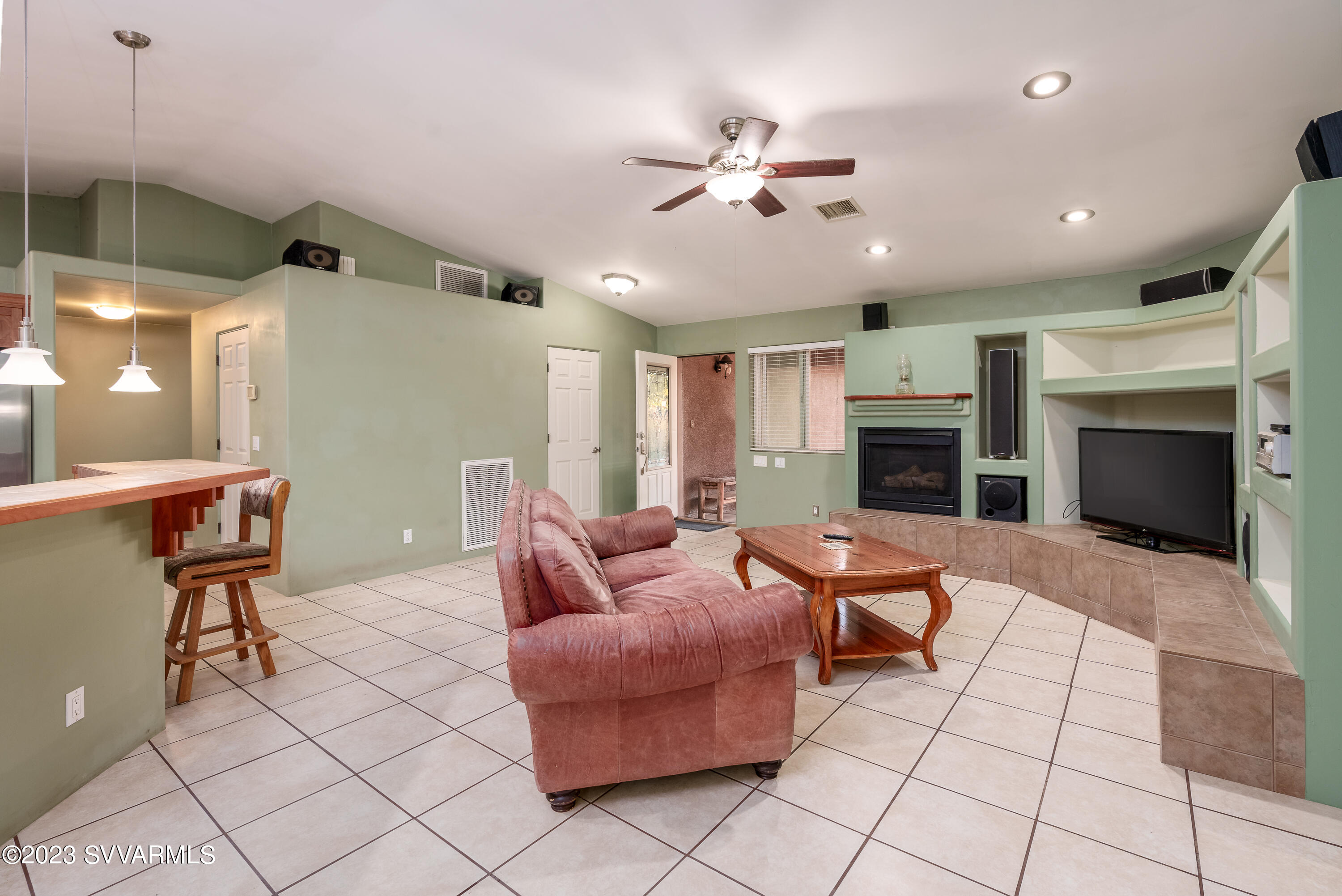1055 Reay Road Rimrock, AZ 86335 - Photo 9 of 34 a living room with furniture and a fireplace
