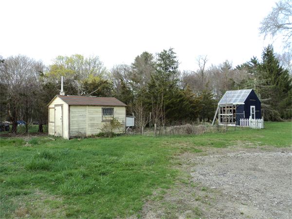 806 County Road Wareham, MA 02576 - Photo 4 of 19 a house with green field in front of it