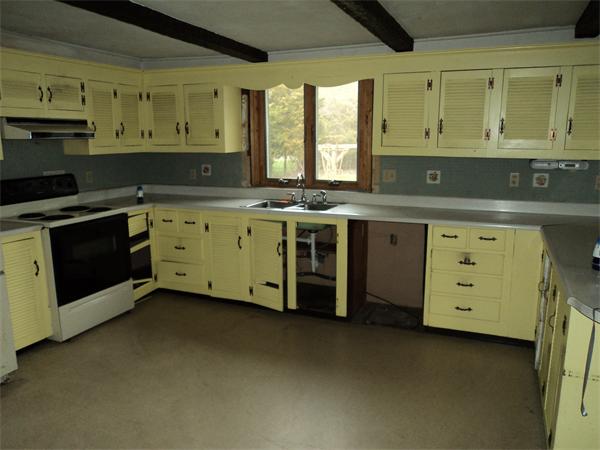 806 County Road Wareham, MA 02576 - Photo 10 of 19 a kitchen with a stove sink and cabinets
