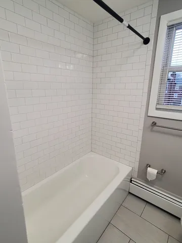 a bathroom with a bathtub