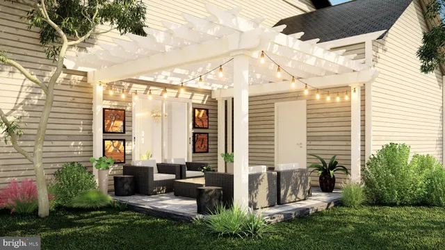 a view of a patio with table and chairs and potted plants