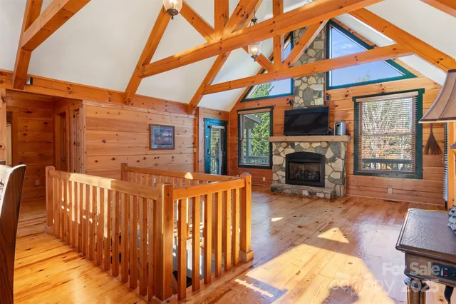 a view of a house with a porch and furniture