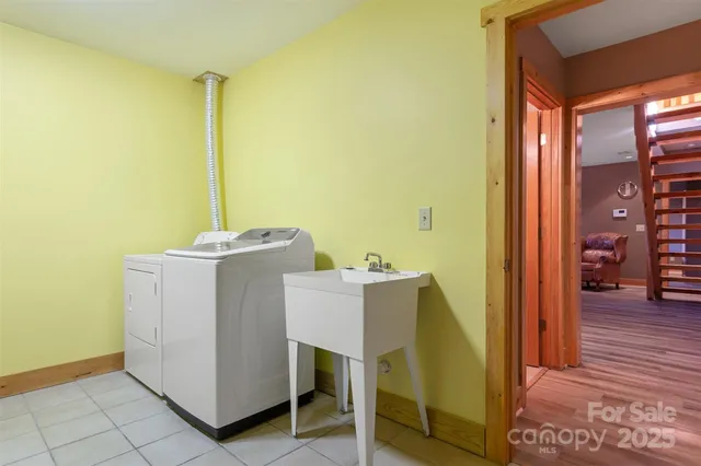 a utility room with dryer and washer