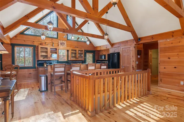 a view of a chairs and tables in the balcony