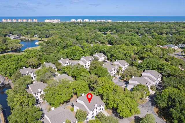 an aerial view of a houses with outdoor space and street view