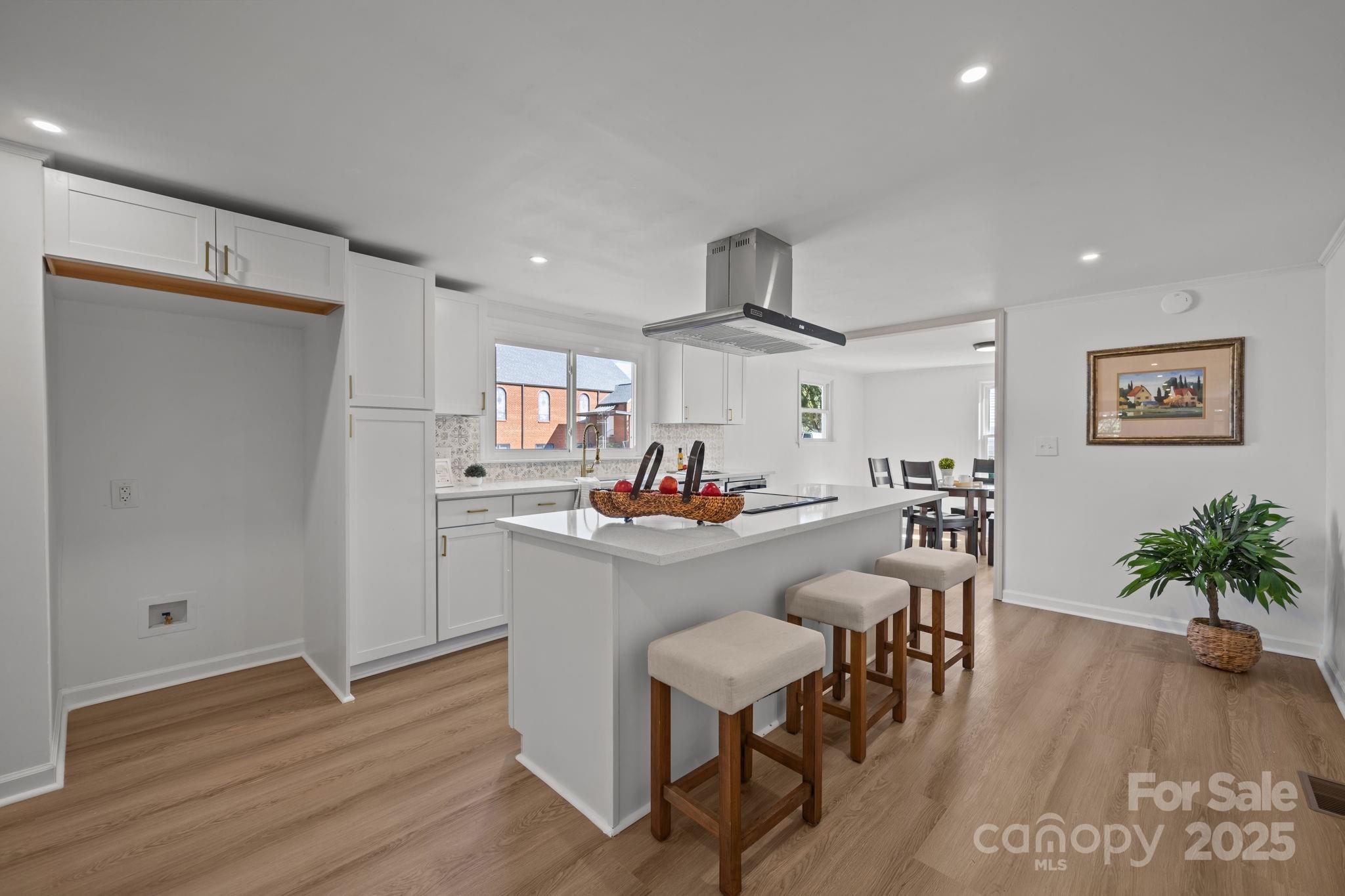 1362 Cornatzer Road Mocksville, NC 27028 - Photo 11 of 48 a view of a dining room with furniture wooden floor and entryway