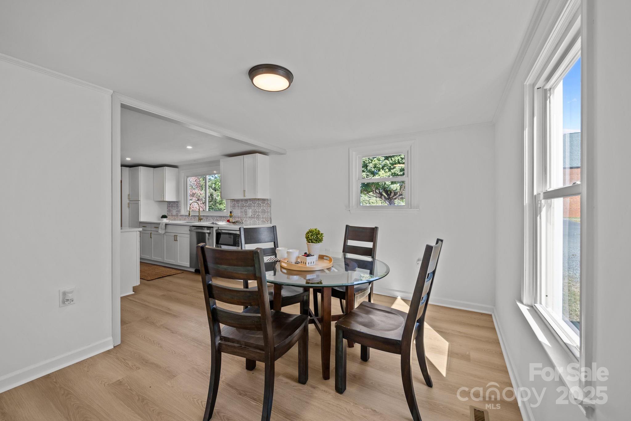 1362 Cornatzer Road Mocksville, NC 27028 - Photo 15 of 48 a view of a dining room with furniture and window