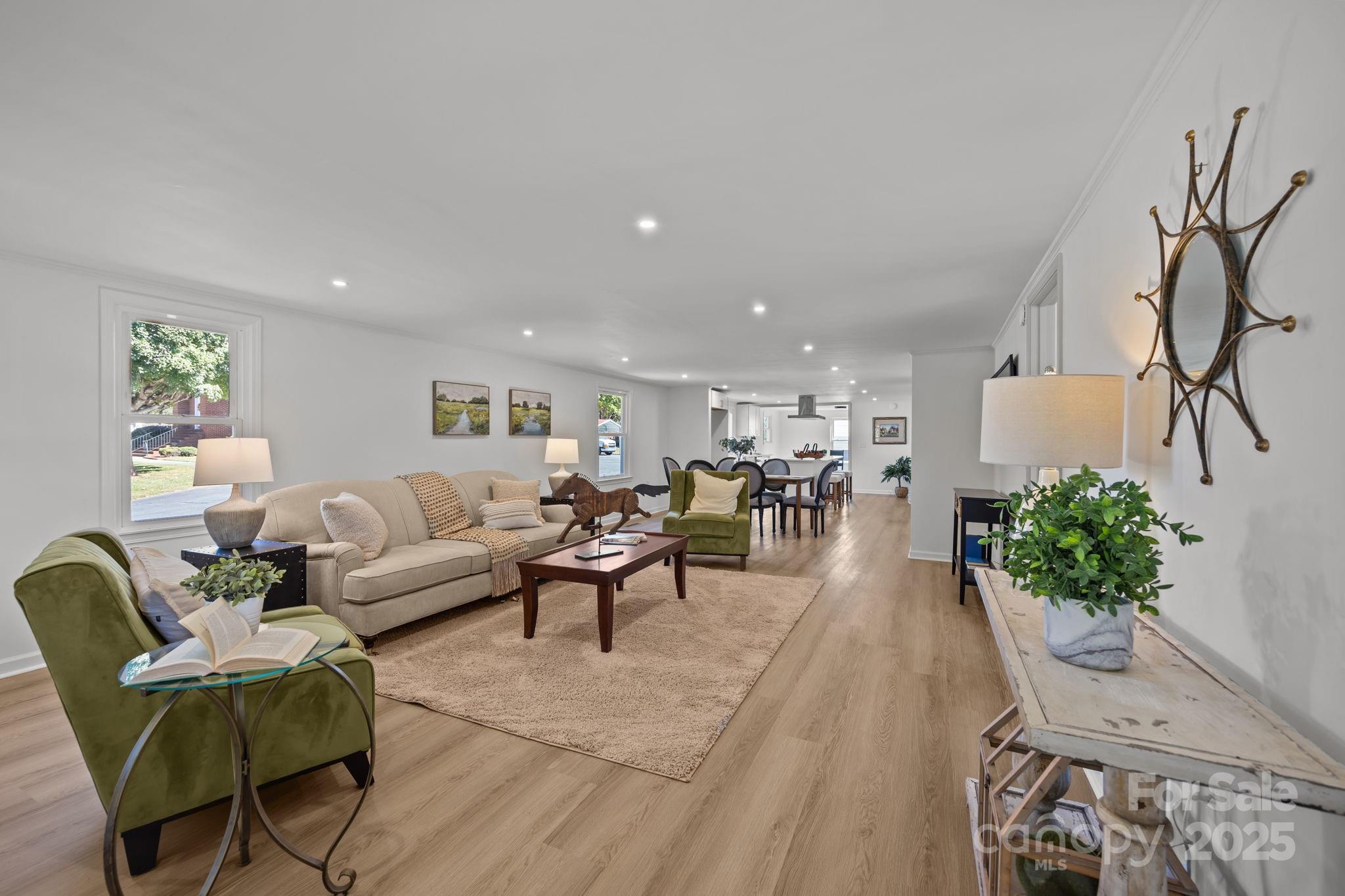 1362 Cornatzer Road Mocksville, NC 27028 - Photo 2 of 48 a living room with furniture potted plant and a table