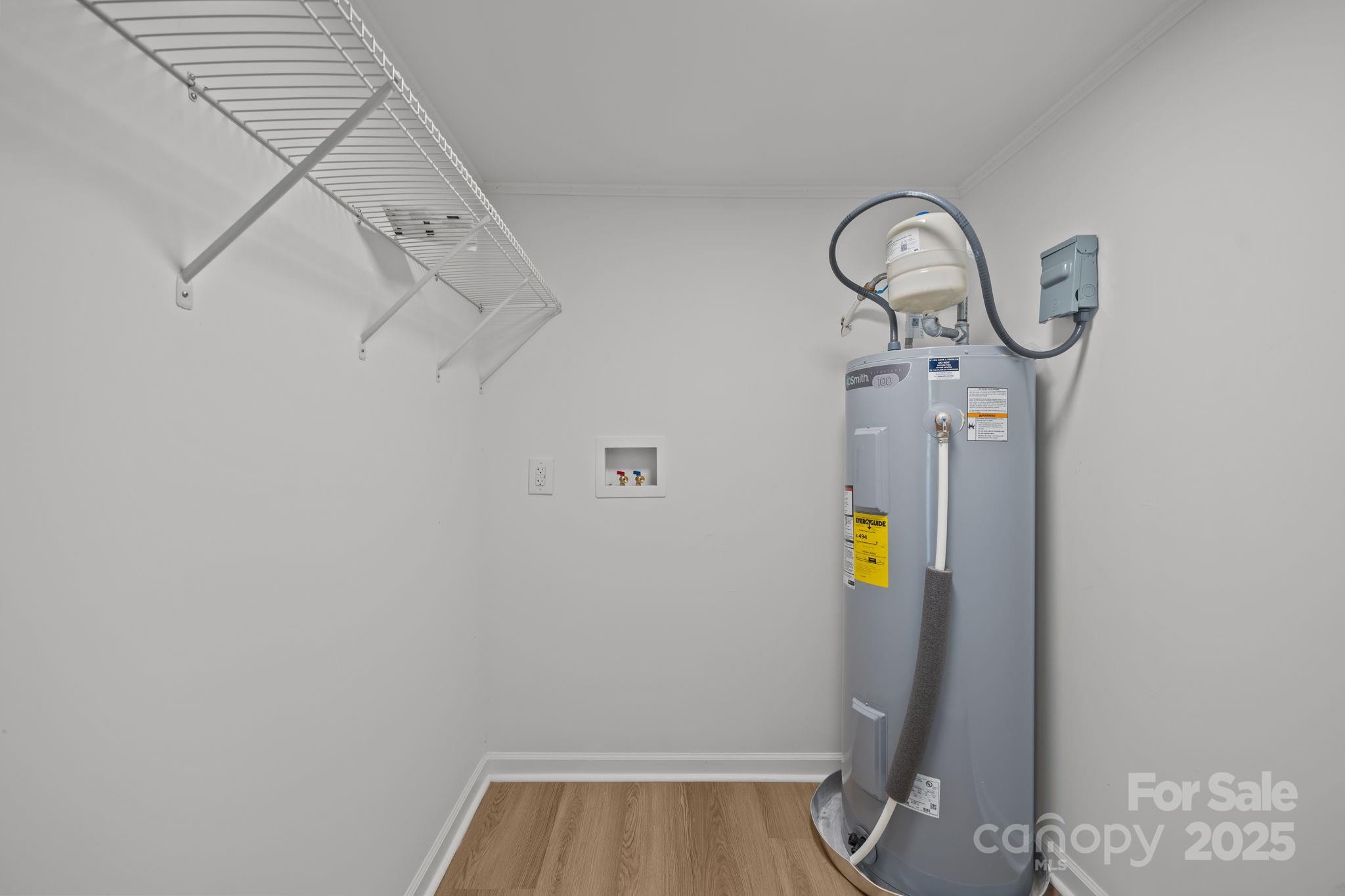 1362 Cornatzer Road Mocksville, NC 27028 - Photo 21 of 48 a view of storage and utility room with racks on the wall