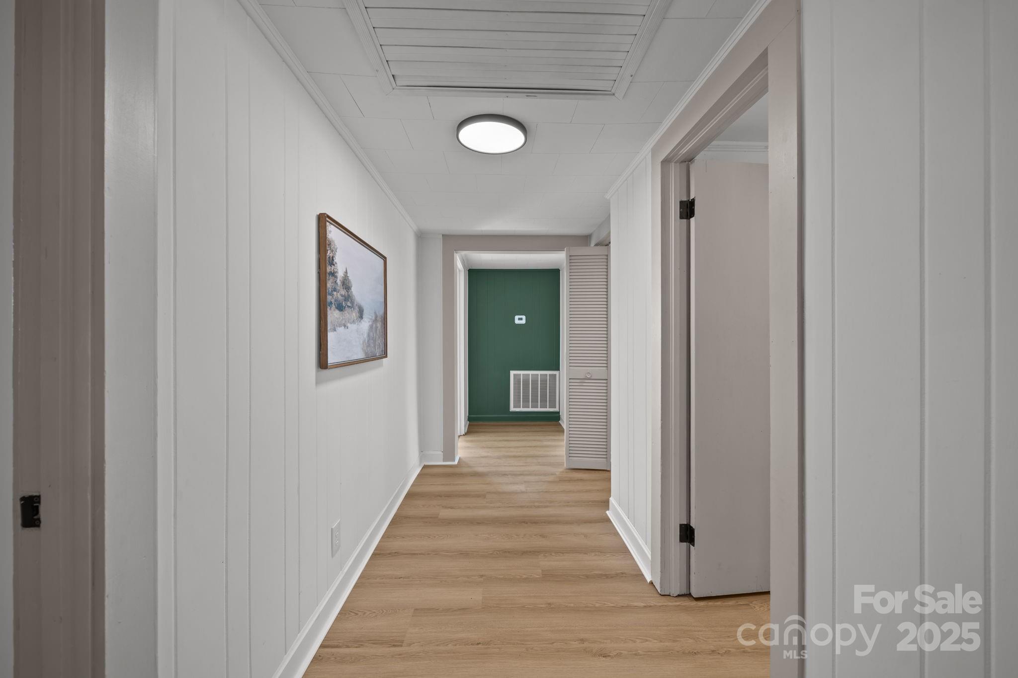 1362 Cornatzer Road Mocksville, NC 27028 - Photo 22 of 48 a view of a hallway with wooden floor