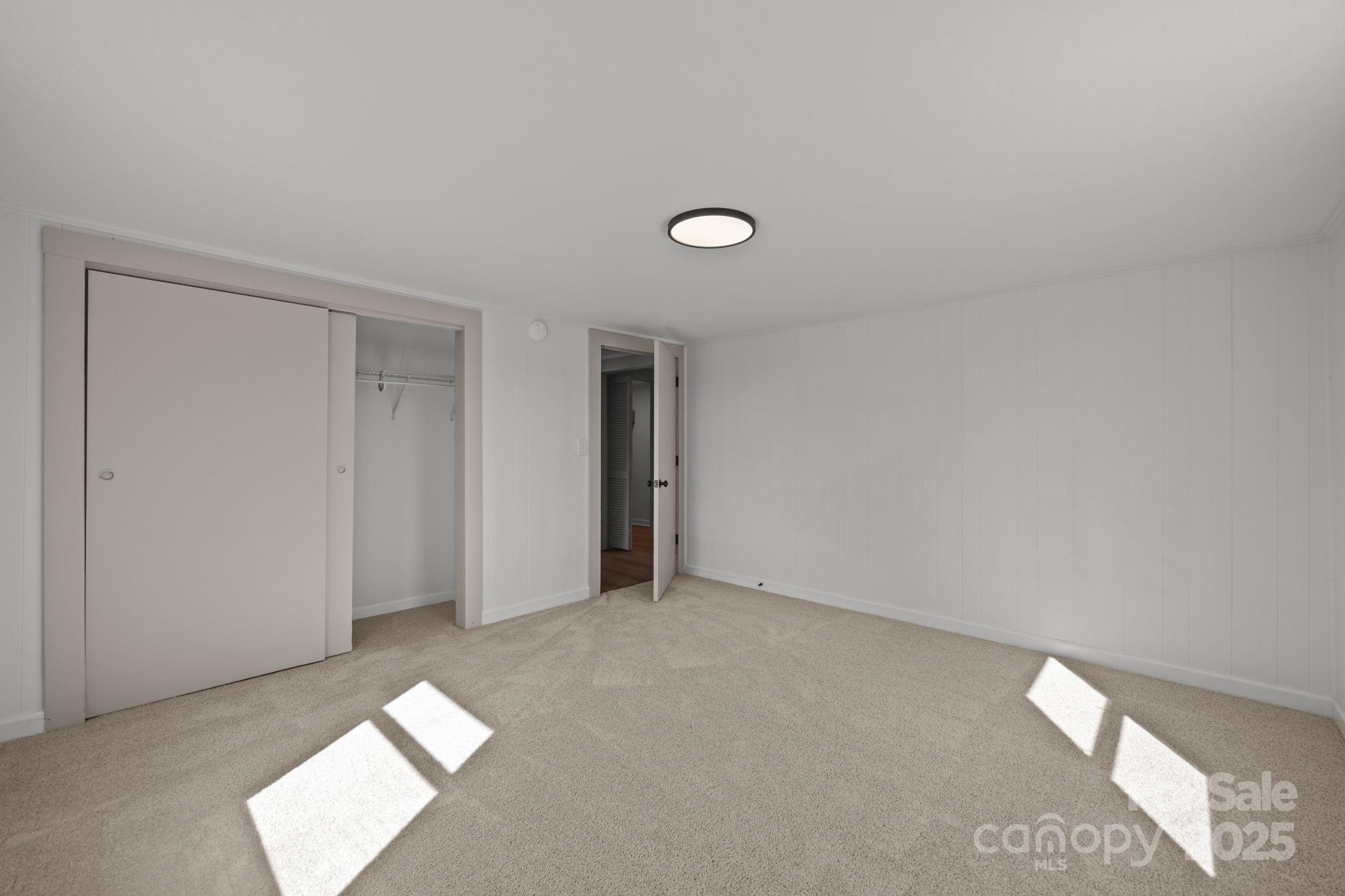 1362 Cornatzer Road Mocksville, NC 27028 - Photo 24 of 48 a view of an empty room with a window