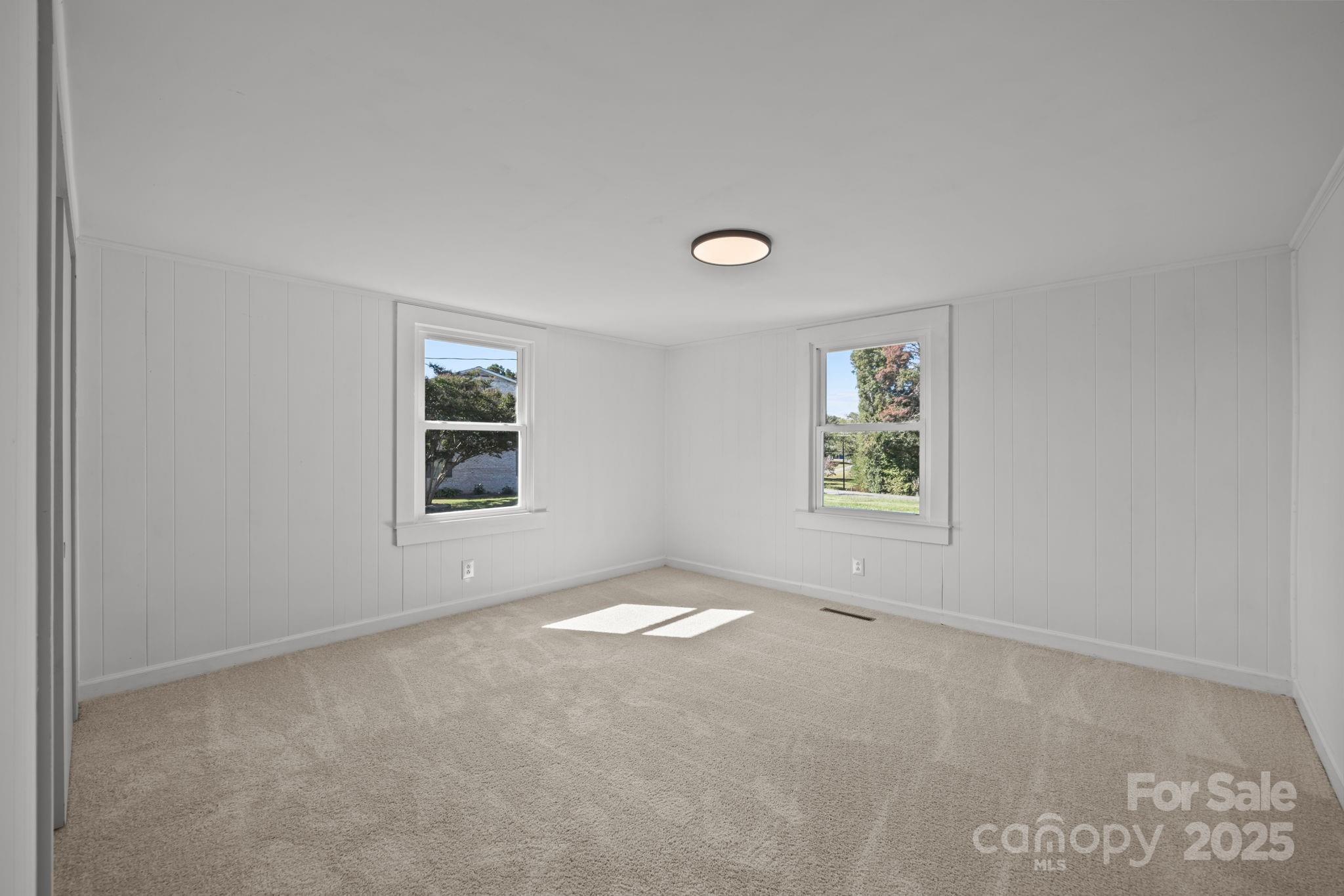 1362 Cornatzer Road Mocksville, NC 27028 - Photo 25 of 48 an empty room with windows