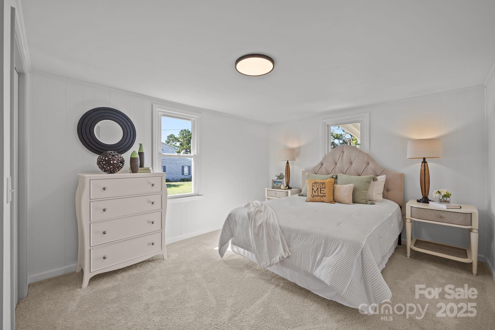 1362 Cornatzer Road Mocksville, NC 27028 - Photo 27 of 48 a bedroom with a bed and a dresser