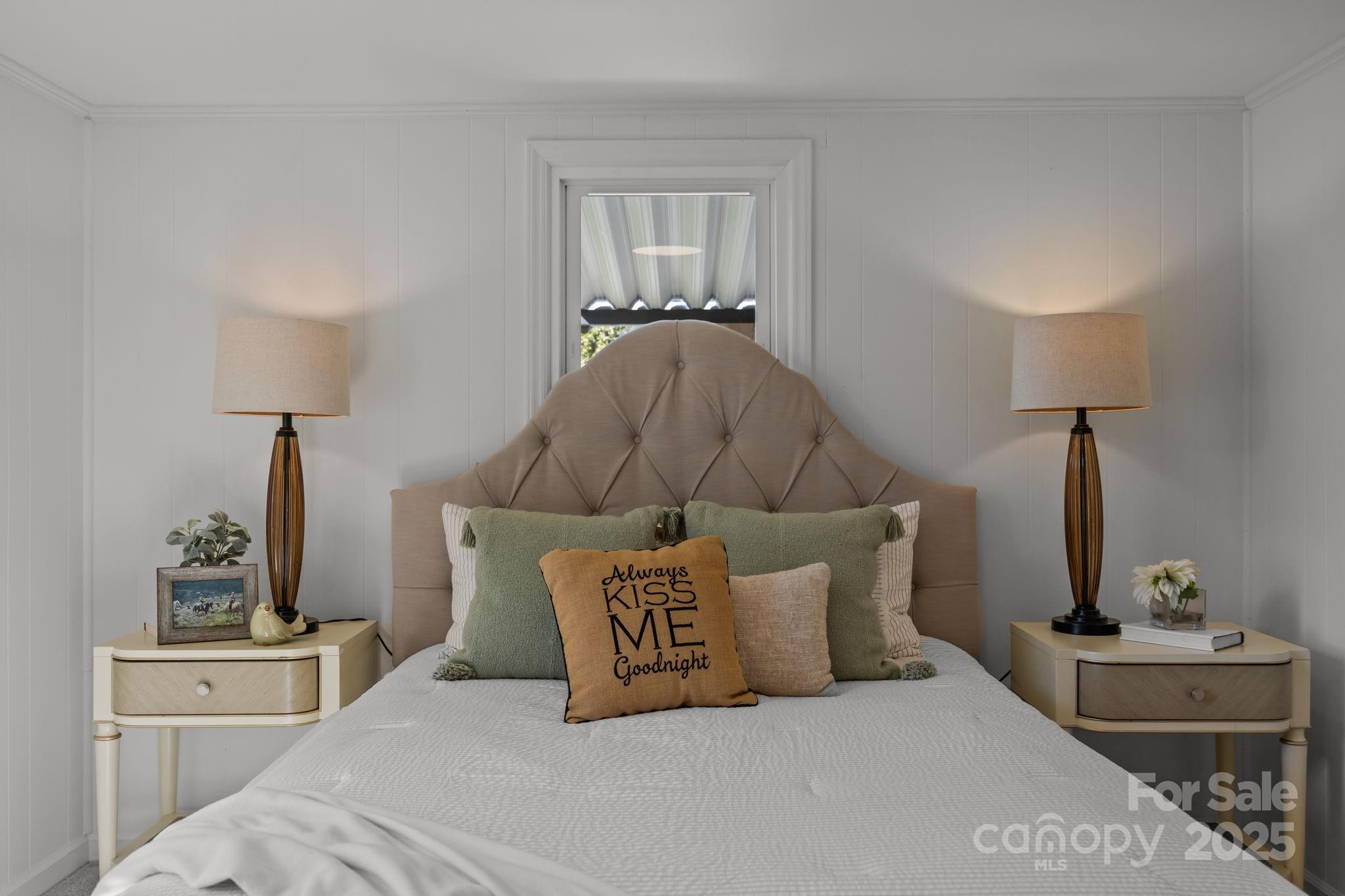 1362 Cornatzer Road Mocksville, NC 27028 - Photo 28 of 48 a bedroom with a bed and wooden floor