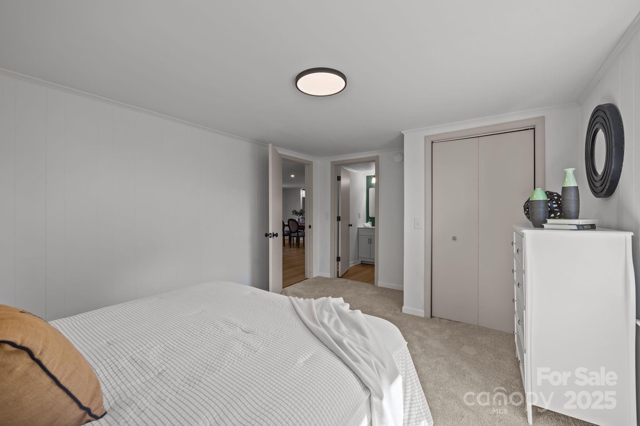 1362 Cornatzer Road Mocksville, NC 27028 - Photo 29 of 48 a bedroom with a bed and a view of bathroom