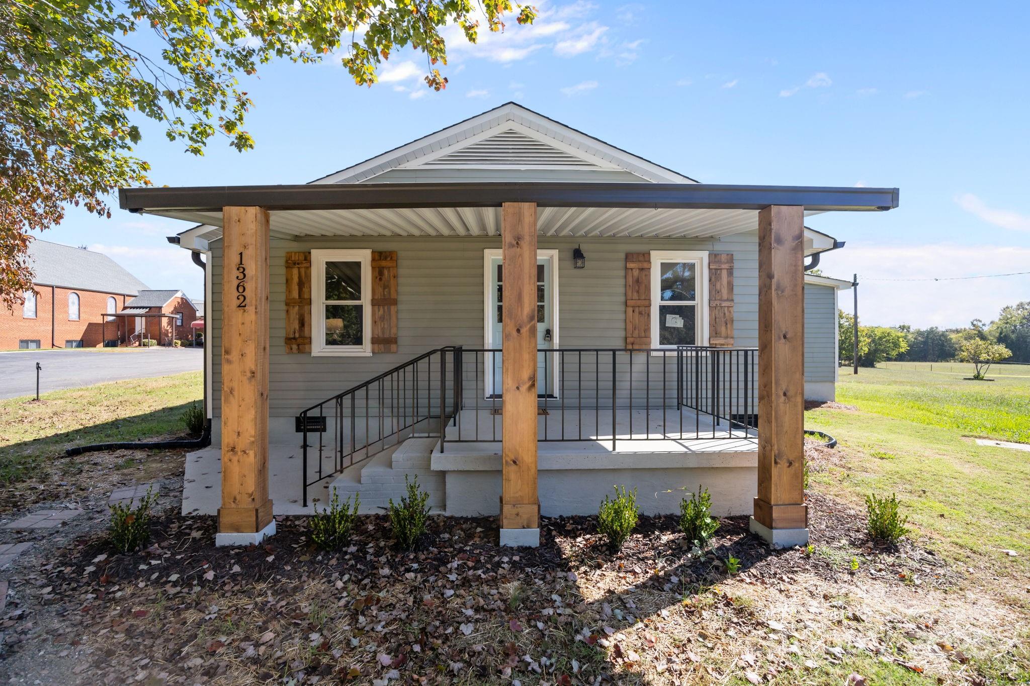 1362 Cornatzer Road Mocksville, NC 27028 - Photo 35 of 48 a front view of a house with a yard