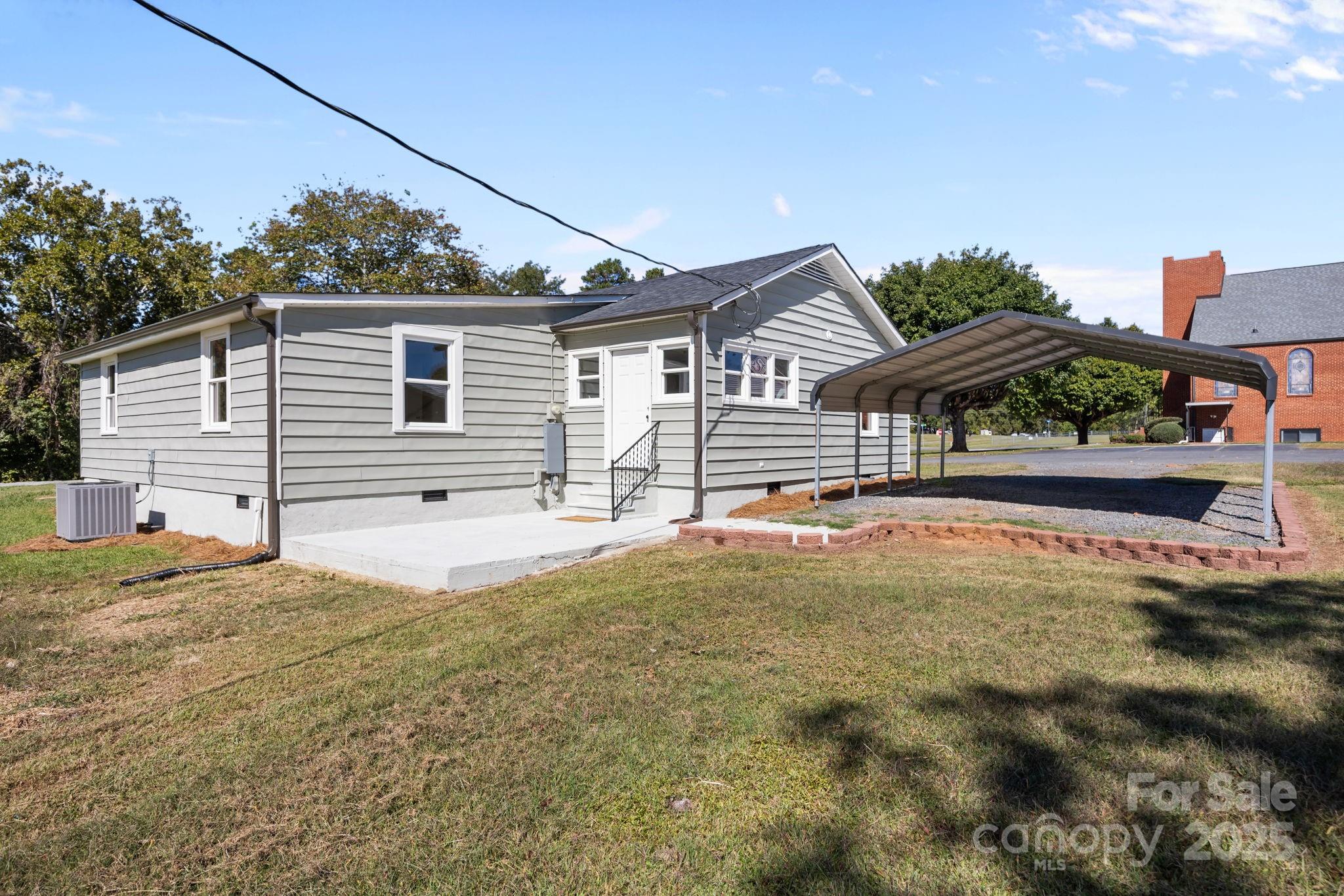 1362 Cornatzer Road Mocksville, NC 27028 - Photo 38 of 48 a house view with a backyard space